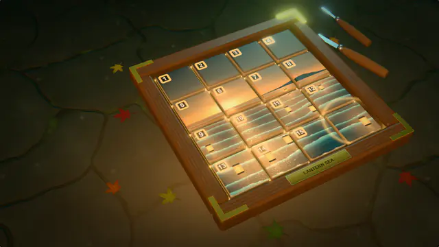 A walnut tray of carved, numbered tiles at dusk, gold glowing in the seams between the pieces of a painted sea with floating lanterns.